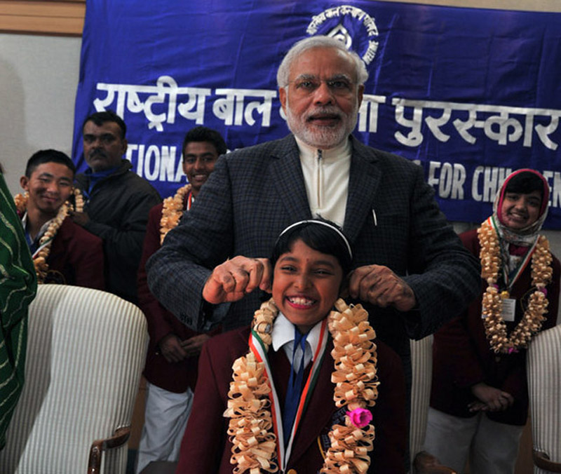 Modi's ear-pulling at a children's awards function.