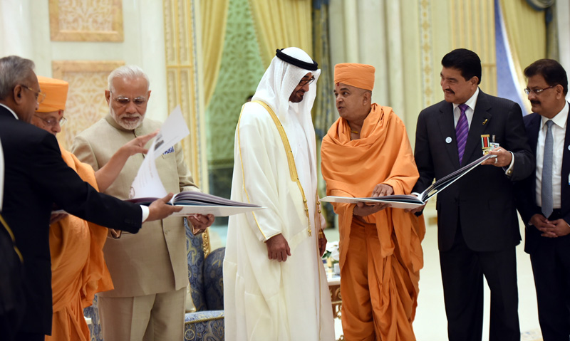 BAPS committee members presenting temple literature to Indian Prime Minister, Narendra Modi and Abu Dhabi Crown Prince Sheikh Mohammed Bin Zayed Al Nahyan at Presidential Palace in Abu Dhabi on February 10.