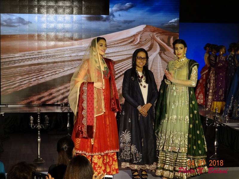 Anju Modi flanked by models