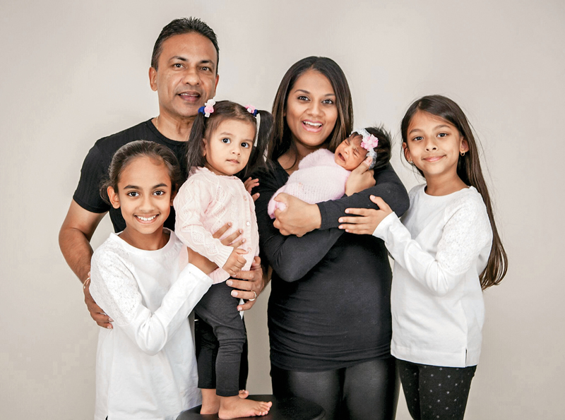 Roy Singh with his wife and kids