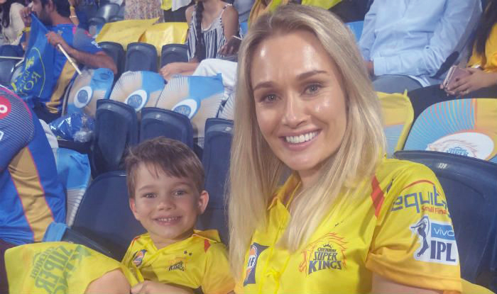 Shane Watson's wife and son in the jersey of his team Chennai Super Kings.