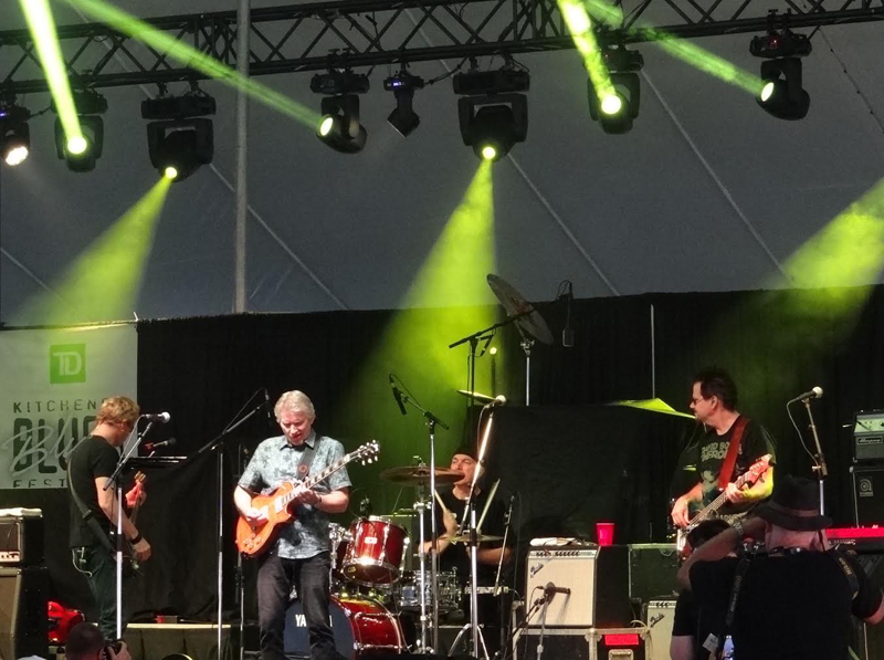 Rik Emmett and his band at Kitchener Blues