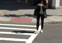Cell phone fines during road crossing