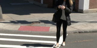 Cell phone fines during road crossing