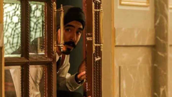 Dev Patel as Sikh waiter Arjun in Hotel Mumbai.
