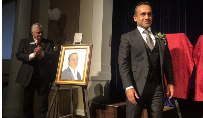 Peter Dhillon (right) during his induction into Canadian Agriculture Hall of Fame in Toronto