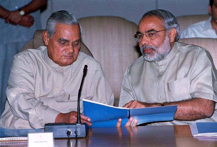 Modi (right) seen with Atal Behari Vajpayee